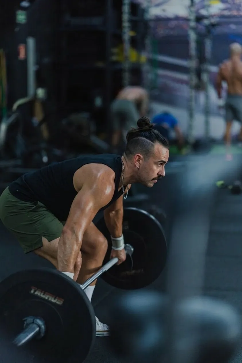 Athlete In Gym Lifting